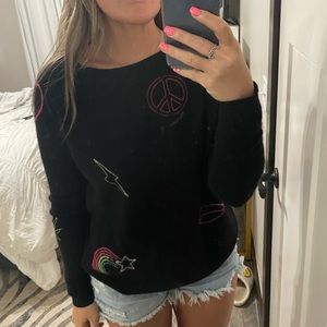 Aqua cashmere sweater with symbols